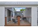 View of the home's patio area with string lights and stylish seating at 183 Cleveland # B, Atlanta, GA 30316