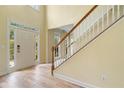 Bright foyer featuring hardwood floors and staircase at 2956 Nestle Creek Dr, Marietta, GA 30062