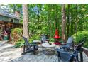 Outdoor patio with comfortable seating, perfect for entertaining guests at 4686 Buckskin Sw Trl, Lilburn, GA 30047