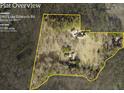 Plat map shows the 10+ acre parcel and the location of the house and outbuildings within the lot lines at 1961 Luke Edwards Rd, Dacula, GA 30019