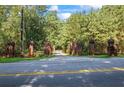 Elegant brick pillars mark the entrance to the property, showcasing a secure and private setting at 1961 Luke Edwards Rd, Dacula, GA 30019