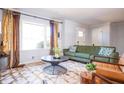 Comfortable living room with a large window, stylish furniture, and plenty of natural light at 2411 Fair Lane Ln, Decatur, GA 30032