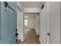 Inviting foyer with light wood floors and fresh white walls, leading into a bright and airy living space at 1373 W Prospect Dr, Lawrenceville, GA 30043
