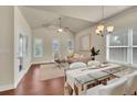 Bright and airy living room with hardwood floors, vaulted ceilings, and modern furnishings at 1550 Rolling View Dr, Cumming, GA 30040