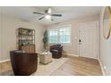 Inviting sitting area boasting hardwood floors, a ceiling fan, natural light, and comfortable seating at 2775 Belleau Se Ln, Atlanta, GA 30316