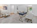 Bright office with a desk, chair, and neutral carpet at 786 Mitsy Pt, Marietta, GA 30068