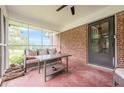 Spacious screened porch with ample seating, offering a serene outdoor experience at 5709 Center Hill Church Rd, Loganville, GA 30052