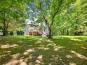 Spacious backyard featuring a wooden deck, perfect for outdoor gatherings and relaxation at 5020 Bayberry Dr, Cumming, GA 30040