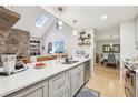 Modern kitchen with a spacious island, sleek countertops, and stainless steel appliances at 2653 Partridge Trl, Duluth, GA 30097