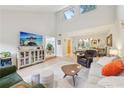 Bright living room featuring soaring ceilings, ample natural light and neutral colors at 2653 Partridge Trl, Duluth, GA 30097