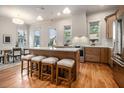 Spacious kitchen featuring a large island with seating, stainless steel appliances, and hardwood floors at 50 Howell Se St # A, Atlanta, GA 30312