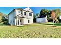 Well-maintained lawn with lush grass and a detached garage at 12 Confederate Nw St, Cartersville, GA 30121