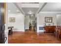 Elegant foyer features hardwood floors, high ceilings, and access to multiple rooms at 2660 Brentwood Estates Ct, Cumming, GA 30041