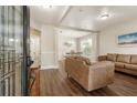 Spacious living room with hardwood floors, fresh paint, and bright, natural light at 424 Citronelle Dr, Woodstock, GA 30188
