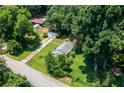 Aerial view of home showcasing lot, landscaping and proximity to the neighborhood at 1054 Hillcrest Se Dr, Atlanta, GA 30316