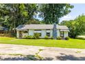 Charming home with a classic design and well-kept lawn, creating inviting curb appeal at 1054 Hillcrest Se Dr, Atlanta, GA 30316