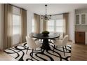 Bright dining room with modern chandelier and large windows at 32 Wadley Nw St, Atlanta, GA 30314
