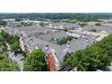 Aerial view of a well-maintained apartment complex, showing the building's layout and parking area at 1850 Cotillion Dr Unit 3416, Atlanta, GA 30338