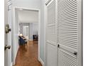 Hallway with closet leading into a living room at 300 Peachtree Ne St # 20 O, Atlanta, GA 30308