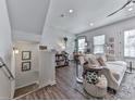 This inviting living room features hardwood floors, natural light, and a cozy seating area at 499 Bishop Ln, Woodstock, GA 30188