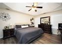 Serene main bedroom with tray ceiling, neutral tones, and ample natural light at 85 Eastwood Frst, Covington, GA 30014