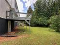 Large backyard featuring a deck and grass at 2691 Old South Dr, Jonesboro, GA 30236