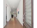 Inviting foyer with hardwood floors that leads into the home's living area at 779 Keystone Dr, Woodstock, GA 30188