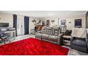 Finished basement with large seating area, wet bar, and walkout access at 4648 Danna Dr, Austell, GA 30106