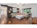Spacious living room boasts hardwood floors and modern decor for a comfortable living space at 5149 Roswell Rd # 1, Atlanta, GA 30342