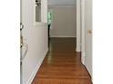 Inviting entryway featuring gleaming hardwood floors and a view into the open living spaces at 2483 Hunting Valley Dr, Decatur, GA 30033