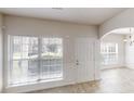Bright entryway with large windows, neutral paint, and classic trim at 2320 Polaris Sw Way, Atlanta, GA 30331