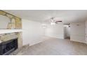 Spacious living room showcasing the stone fireplace and open layout at 3136 Palomino Dr, Powder Springs, GA 30127