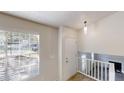 Welcoming entryway with a staircase, large window, and neutral decor at 3457 Newberry Trl, Decatur, GA 30034