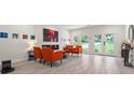 Bright living room with modern decor, a cozy fireplace and access to the backyard at 90 Mckown Rd, Fayetteville, GA 30214