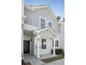 Inviting entrance with black front door, leading into the well-maintained and appealing townhome at 4457 Watson Ridge Dr, Stone Mountain, GA 30083