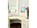Charming office nook featuring a white countertop, cabinets, and view into the adjacent kitchen at 5599 Wheeler Ridge Rd, Auburn, GA 30011