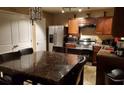 Cozy kitchen and dining area featuring stainless steel appliances and space for 6 at the dining table at 5626 Laurel Ridge Dr, Atlanta, GA 30344