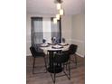 Cozy dining area with modern chandelier and stylish seating for a delightful meal at 4190 Wingfoot Ct, Decatur, GA 30035
