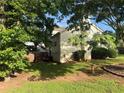 Backyard showcasing trees providing natural shade and space for entertaining at 2765 Dahlonega Trl, Austell, GA 30106