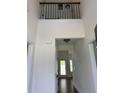 Bright entryway featuring a soaring ceiling and wrought iron details at 5890 Crowley Dr, Douglasville, GA 30135