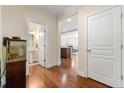 Welcoming entryway with hardwood floors, leading to the living spaces at 8295 Village Pl, Suwanee, GA 30024