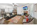 Comfortable living room featuring a cozy fireplace and stylish decor at 4571 Academy St, Acworth, GA 30101