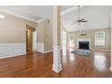 Spacious living room with hardwood floors and a fireplace at 2410 Napa Valley Dr, Villa Rica, GA 30180