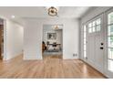 Welcoming entryway boasting hardwood floors and a view into a home office at 2936 Randolph Ne Rd, Atlanta, GA 30345