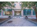 Attractive entrance to the property with lovely landscaping and well-kept building at 300 Peachtree Ne St # 11C, Atlanta, GA 30308