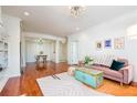 Cozy living room featuring hardwood floors, contemporary decor, and an open layout at 225 E Ponce De Leon Ave # 310, Decatur, GA 30030