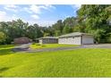 Charming house with a well-manicured lawn and attached garage at 4847 Lakewood Dr, Acworth, GA 30101