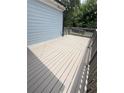 Gray wood deck showing the railing at 3871 Portland Trail Dr, Suwanee, GA 30024