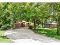 Inviting single-story home featuring a covered carport and a well-maintained yard at 2991 Monterey Drive Dr, Decatur, GA 30032