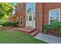 Inviting brick front porch and walkway to the front door at 5148 Coolamber Dr, Powder Springs, GA 30127
